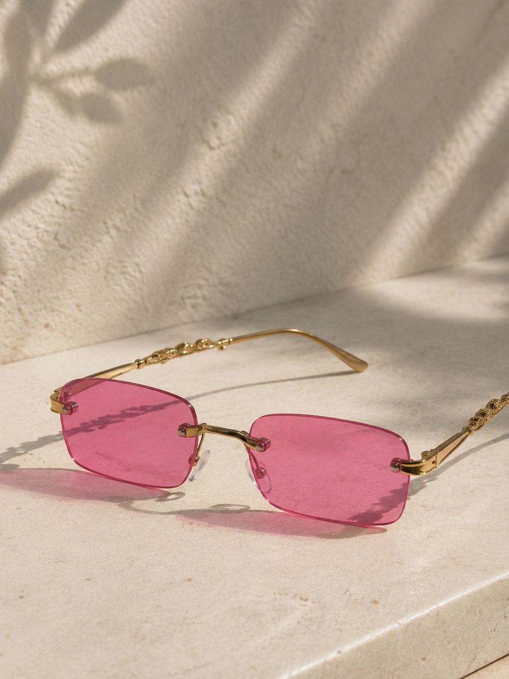 Rimless Pink Lens Sunglasses with Gold Frame
